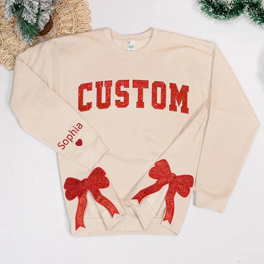 Gepersonaliseerde kersttrui met geborduurde strik, trui met strik aan de zijkant en applicatie, glitterkersttrui