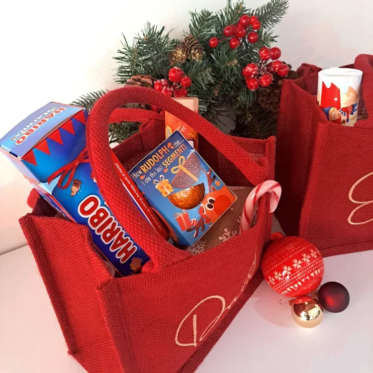 Gepersonaliseerde geborduurde kerstcadeautas