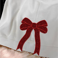 Gepersonaliseerde kersttrui met geborduurde strik, trui met strik aan de zijkant en applicatie, glitterkersttrui