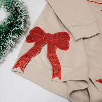 Gepersonaliseerde kersttrui met geborduurde strik, trui met strik aan de zijkant en applicatie, glitterkersttrui
