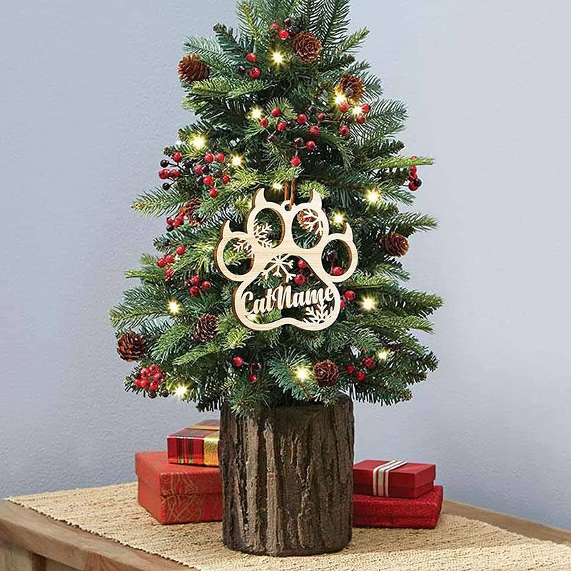 Aangepaste houten kerstversiering met naam, hondenpoothanger met vleugels