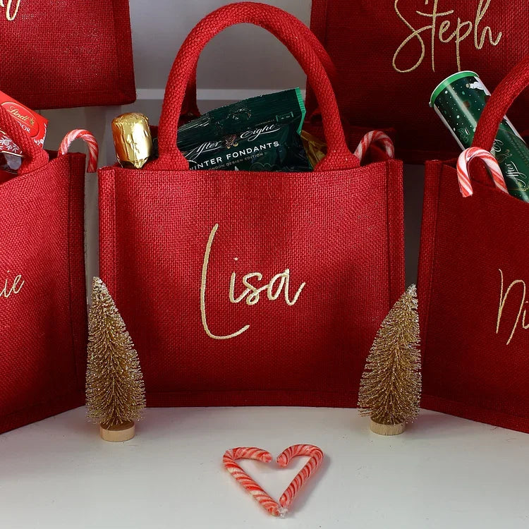 Gepersonaliseerde geborduurde kerstcadeautas