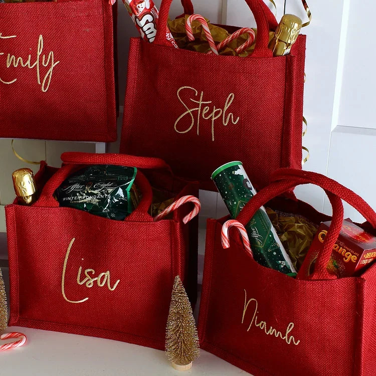 Gepersonaliseerde geborduurde kerstcadeautas