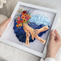 (LED-Schattenbox) Mama hält Händchen – Individuell gestaltbarer Rahmen mit Kindernamen, Blumenherz und Beleuchtung – Geschenkidee zum Muttertag für Mama und Oma