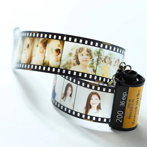 Gepersonaliseerde sleutelhanger met filmrol. Sleutelhanger met meerdere foto's